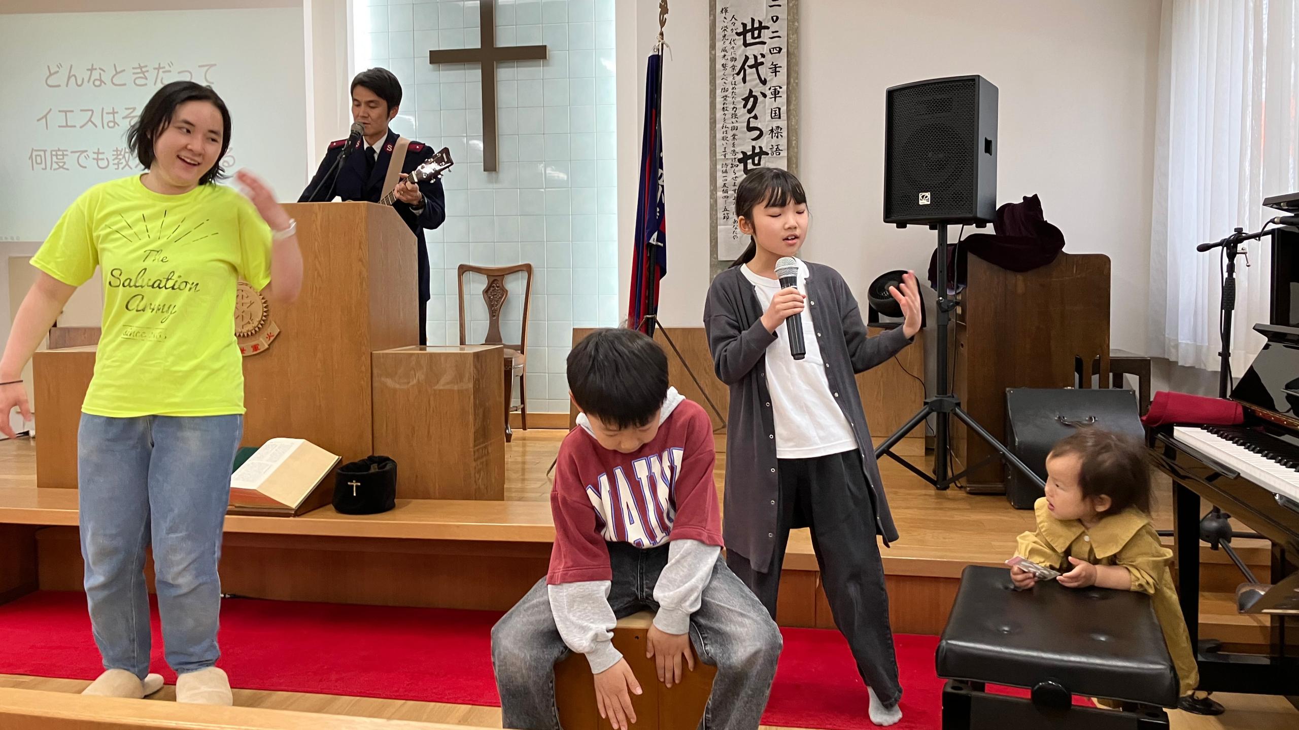 Young people sing in a church service