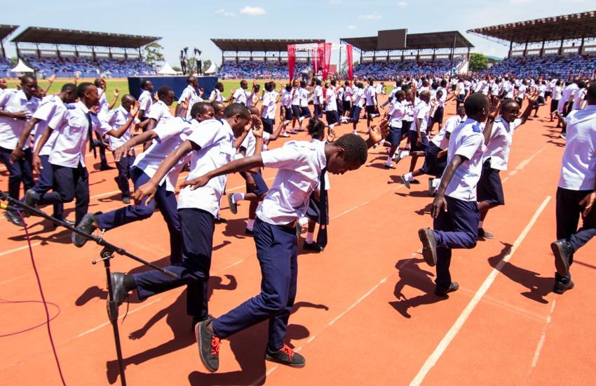 Young people dance in the stadium