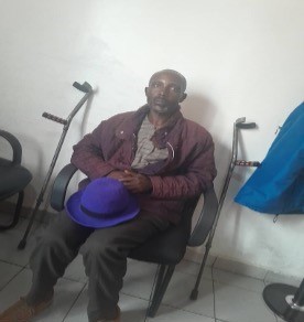 A man sits in a chaie