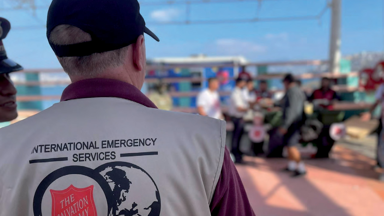 A man wearing an International Emergency Services jacket