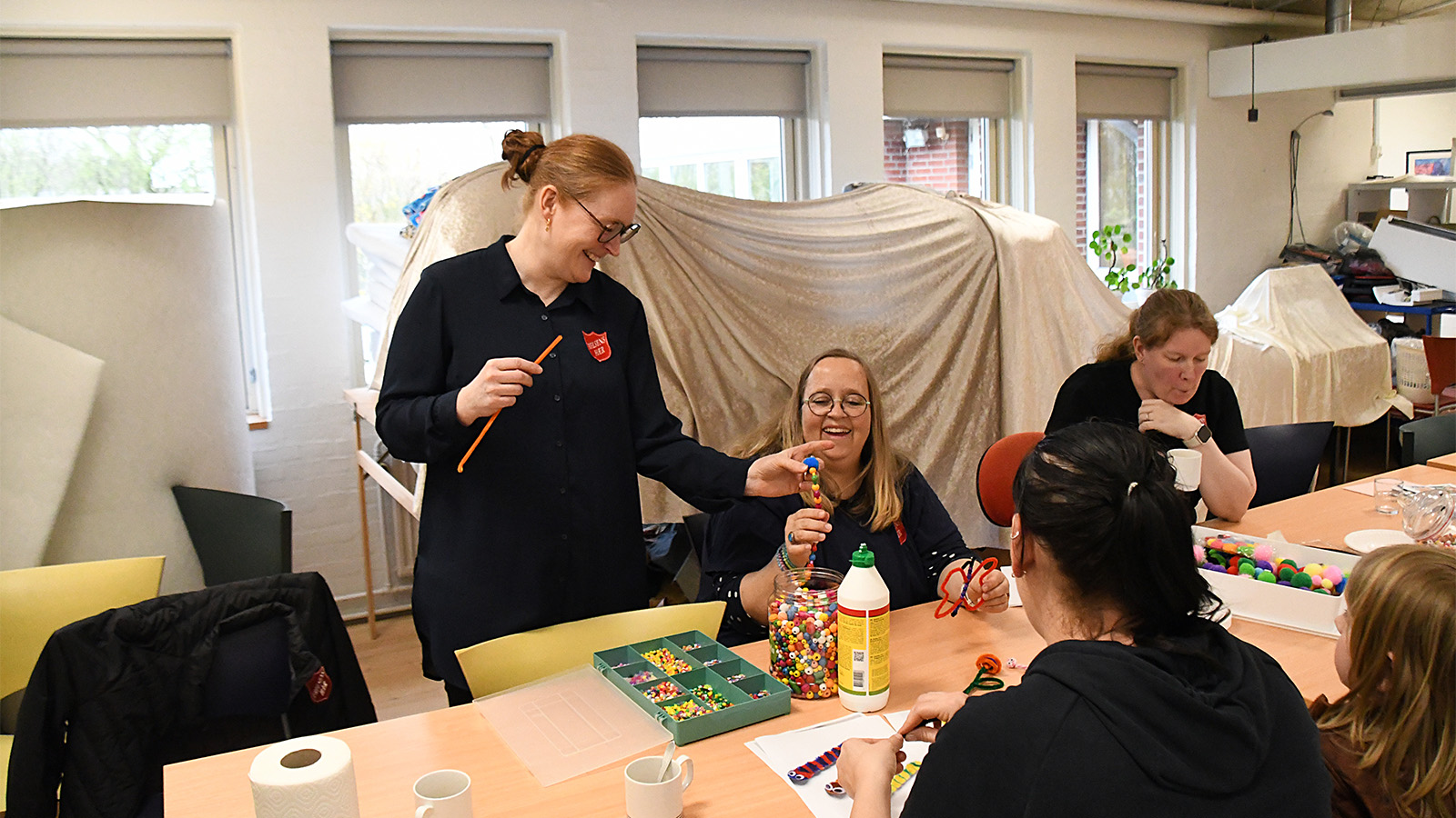People at an arts and crafts table