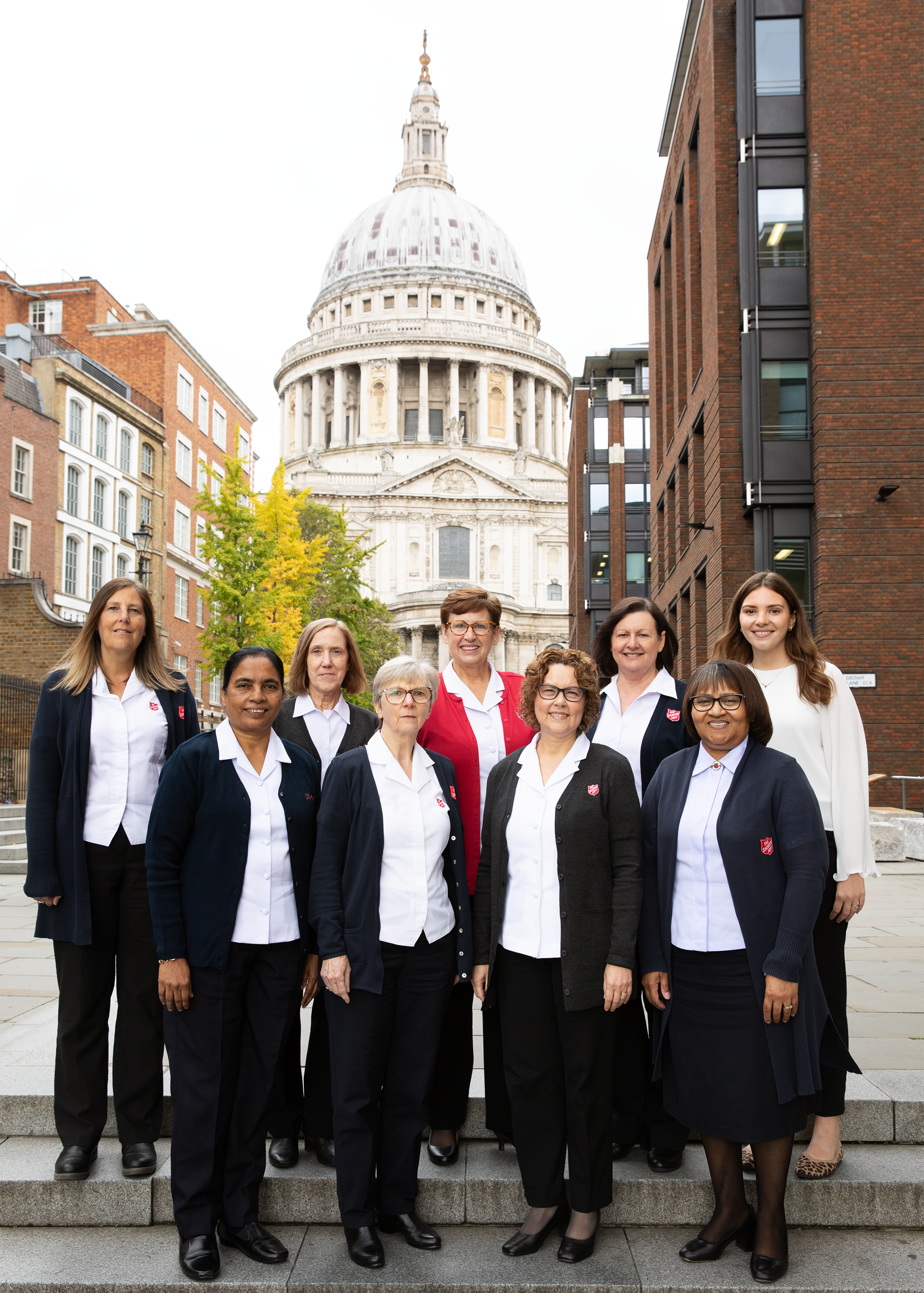 A group of women stand outside St Paul's Cathedral in London