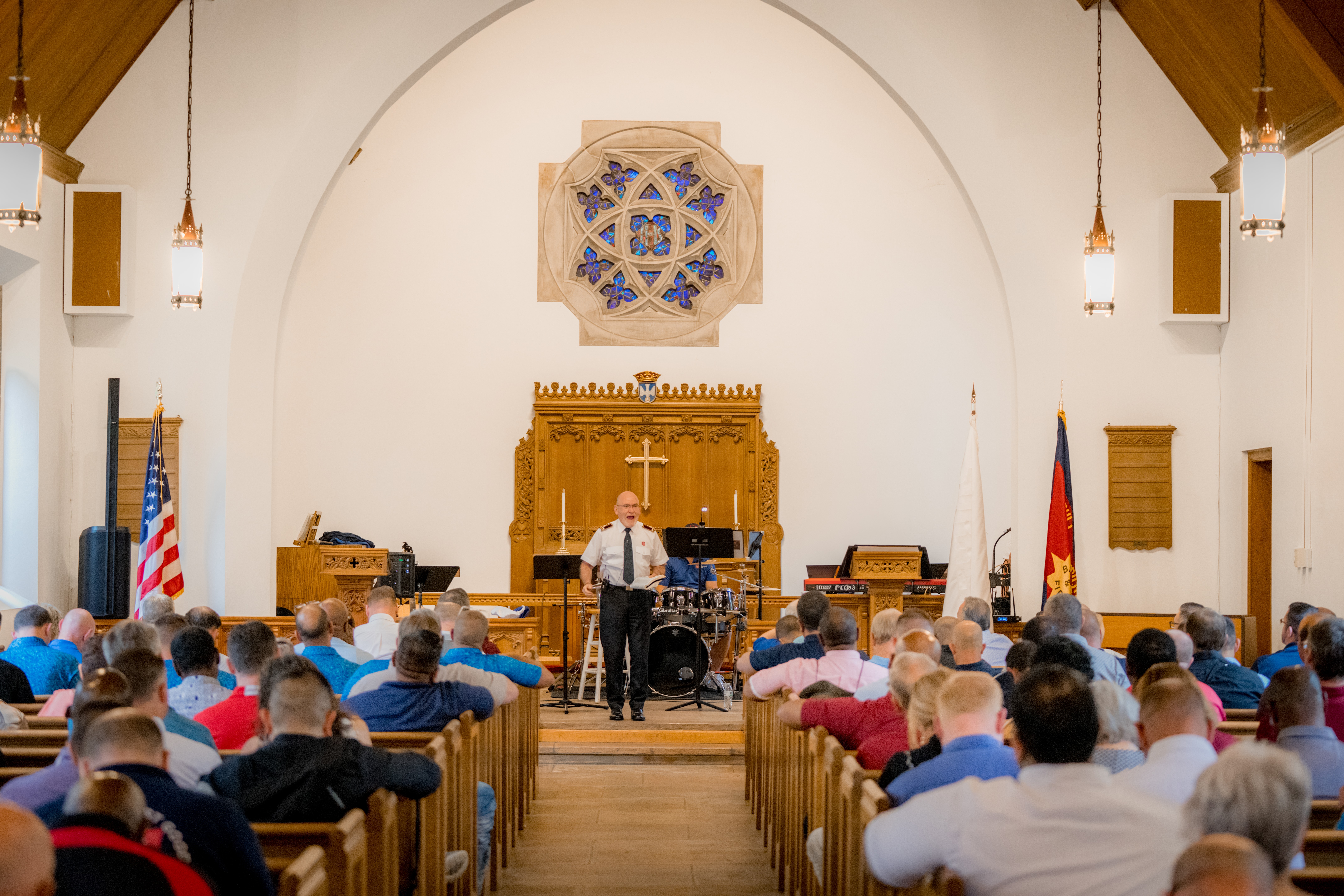General Lyndon Buckingham delivers a morning devotional to the congregation at the church.