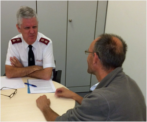 Major Henk van Hattem debriefs