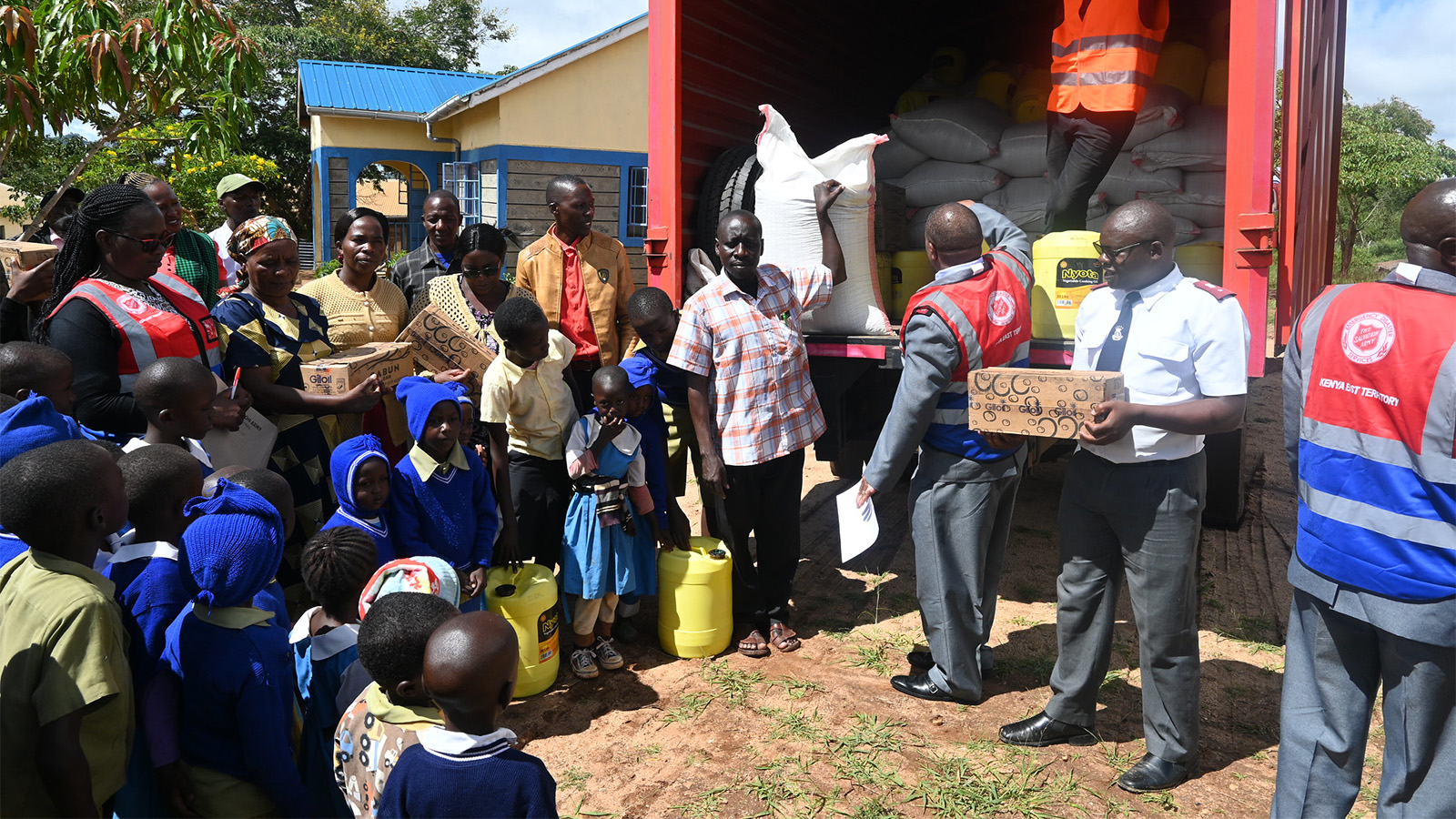 Drought relief is distributed at a school in Makueni