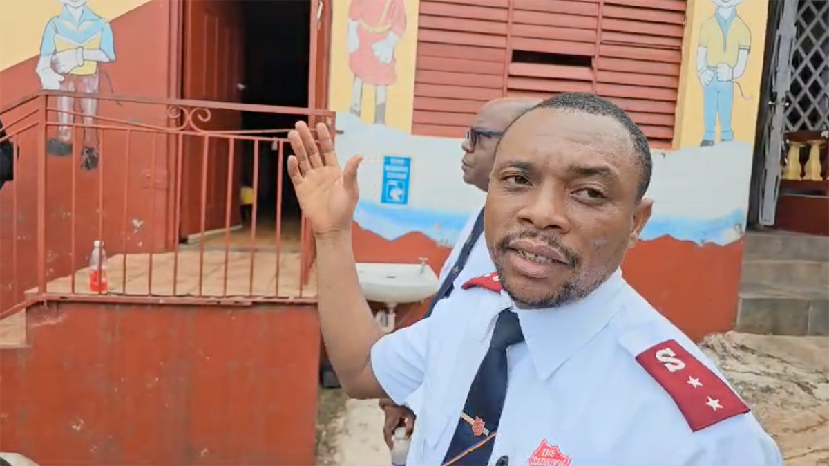 Captain Elysee Leandre surveys damage to a Salvation Army school in Jamaica