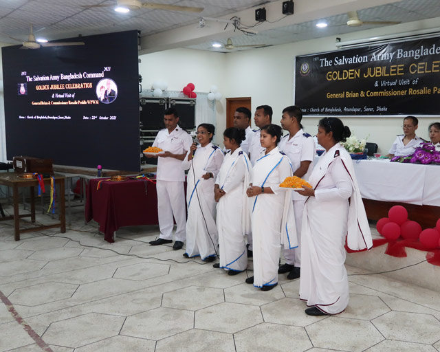 Cadets sing the song Showers of Blessings