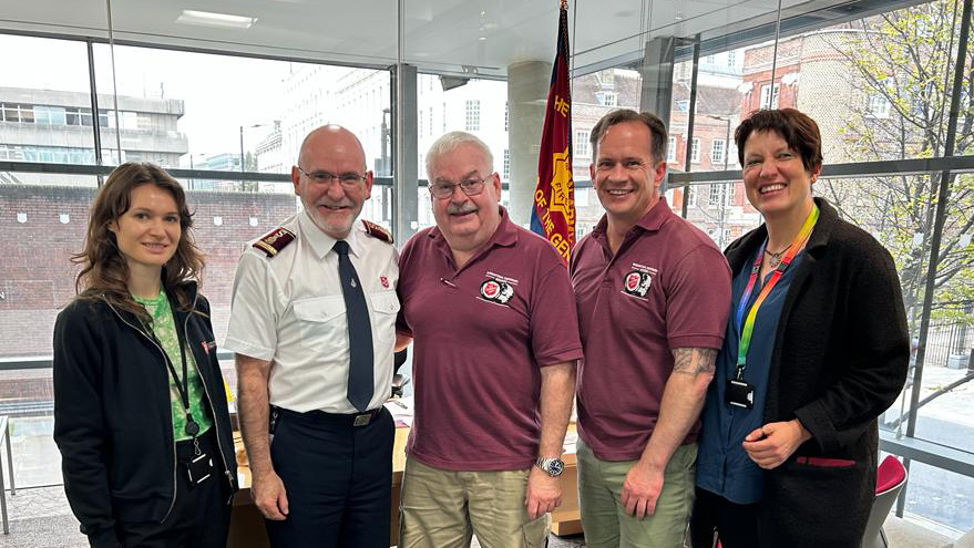 Major Brad Watson with the General and members of the International Emergency Services team