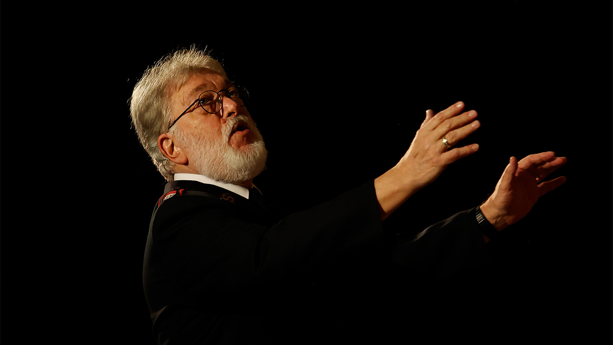 Major Len Ballantine, former leader of the International Staff Songsters and Canadian Staff Songsters, conducts the massed songster brigades (Photo: Mark Yan)