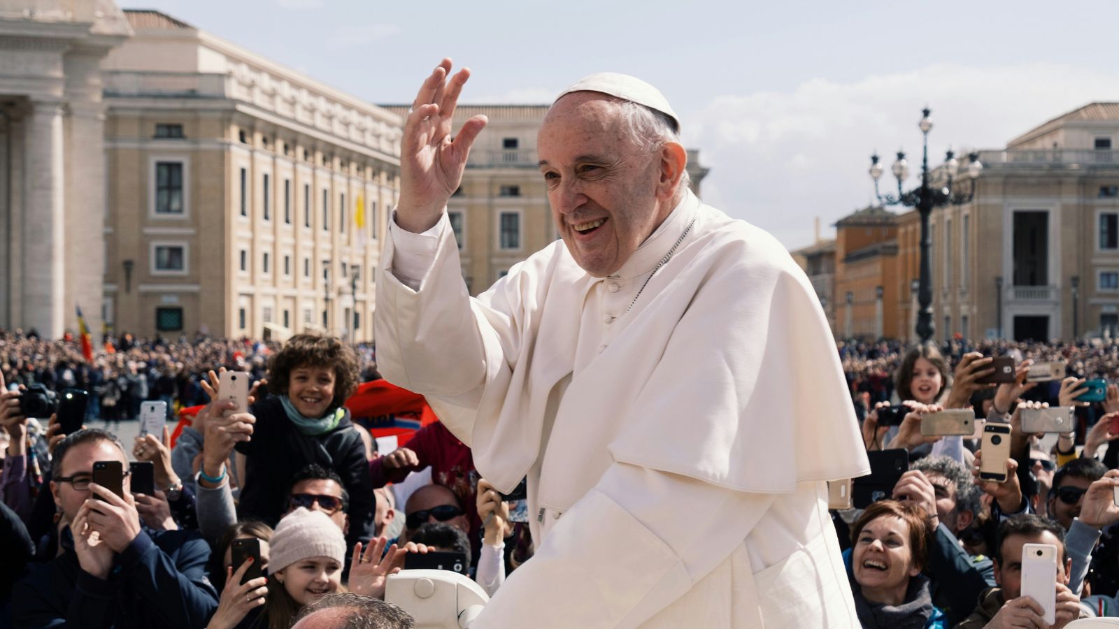 Pope Francis waves to the crowd in Vatican City