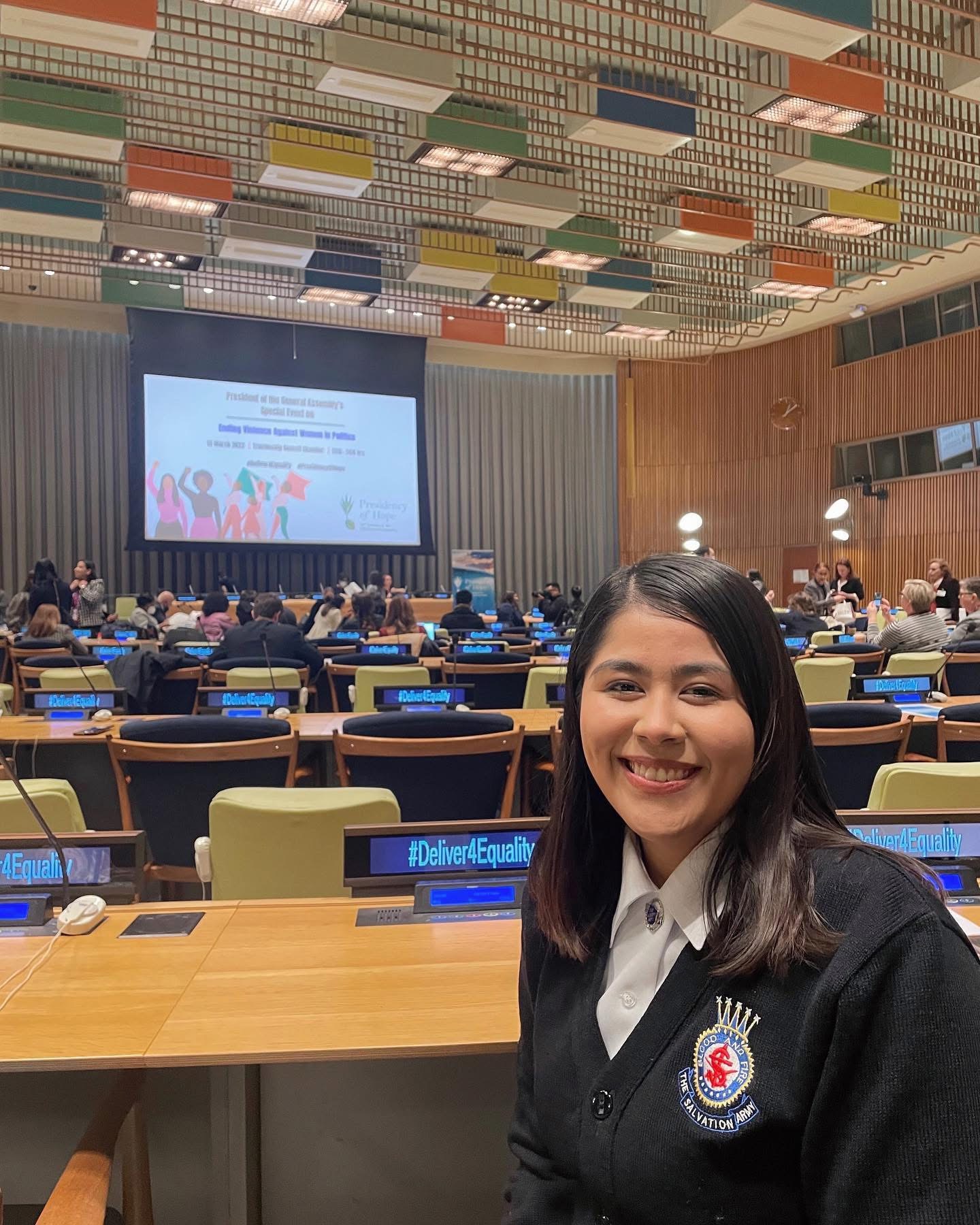 Fernanda is wearing her Salvation Army uniform and sits in a UN conference room