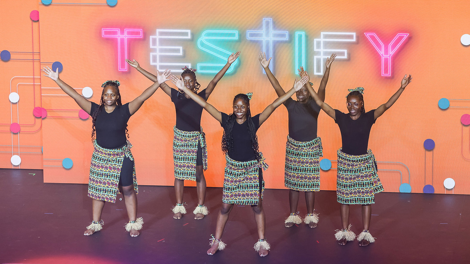 The Phoenix Citadel Dancers tell their story with ‘Agidigba’, an exuberant African dance, during the ‘Celebrate Our Stories!’ main session