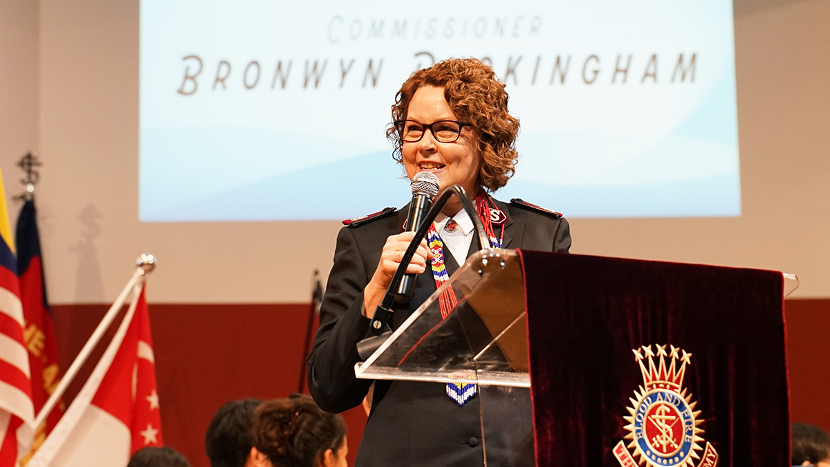 Commissioner Bronwyn Buckingham shares a word of encouragement with Salvationists gathered in Singapore