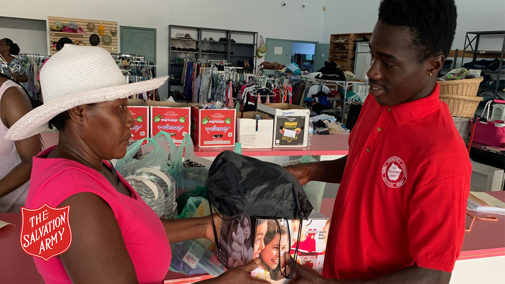 Akeem Cooper helping at the Freeport Salvation Army centre
