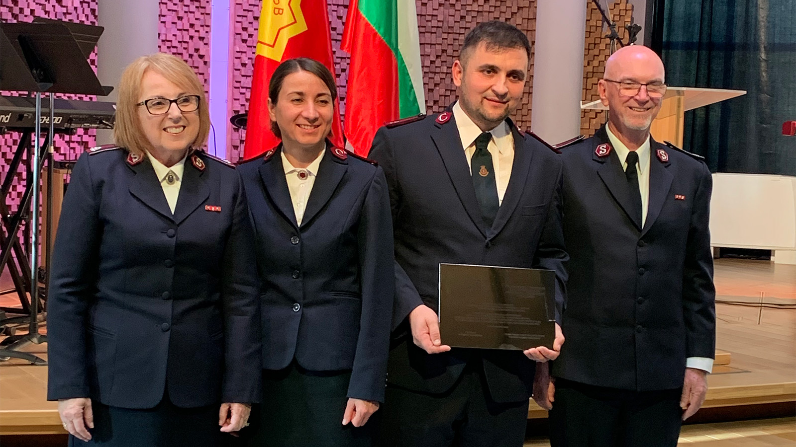Captain Eduard Lebedev receives a certificate to commemorate the official launch of the Army in Bulgaria
