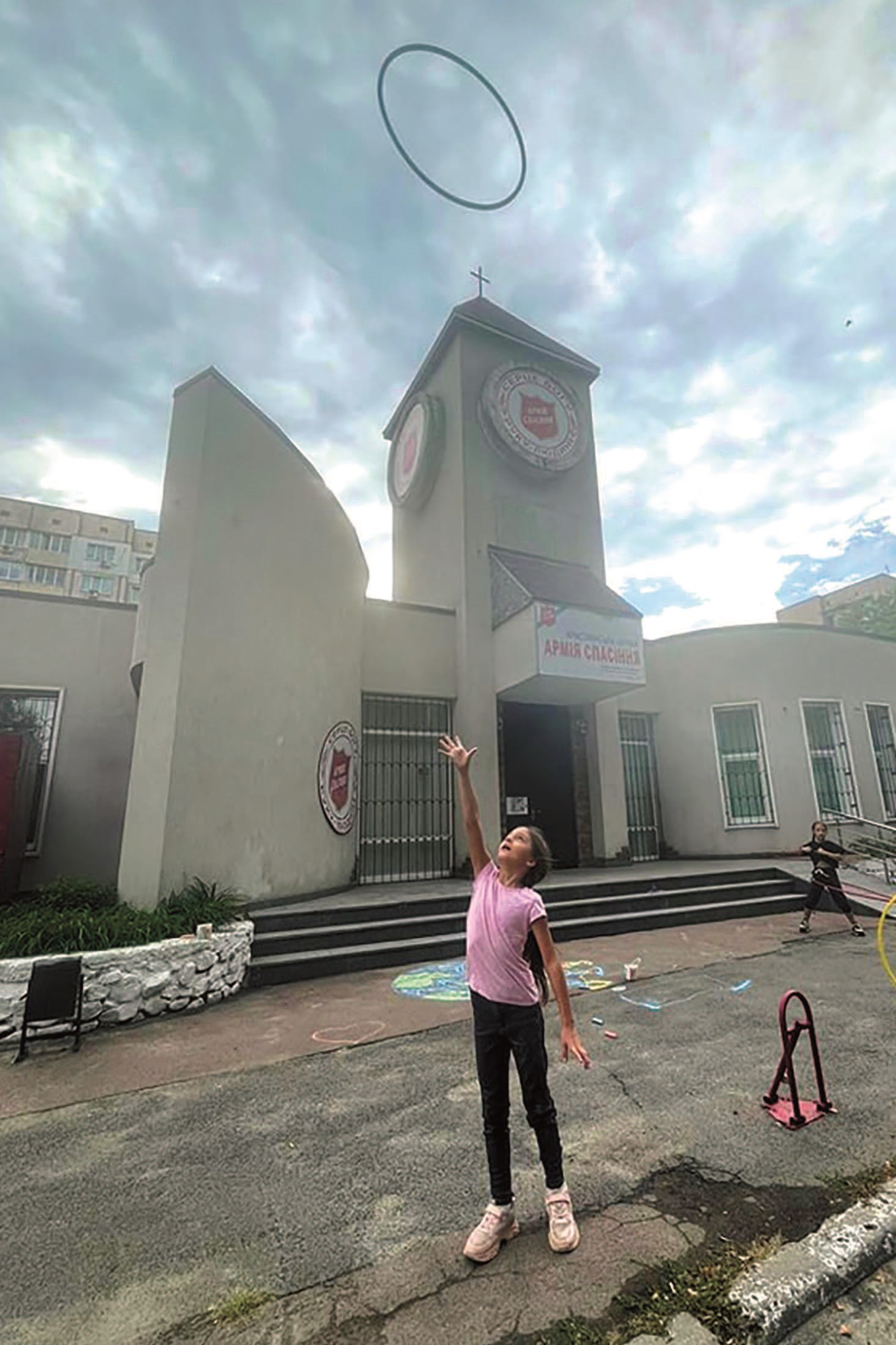 Children play outside a Salvation Army centre in Ukraine