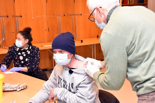 A vaccine being given