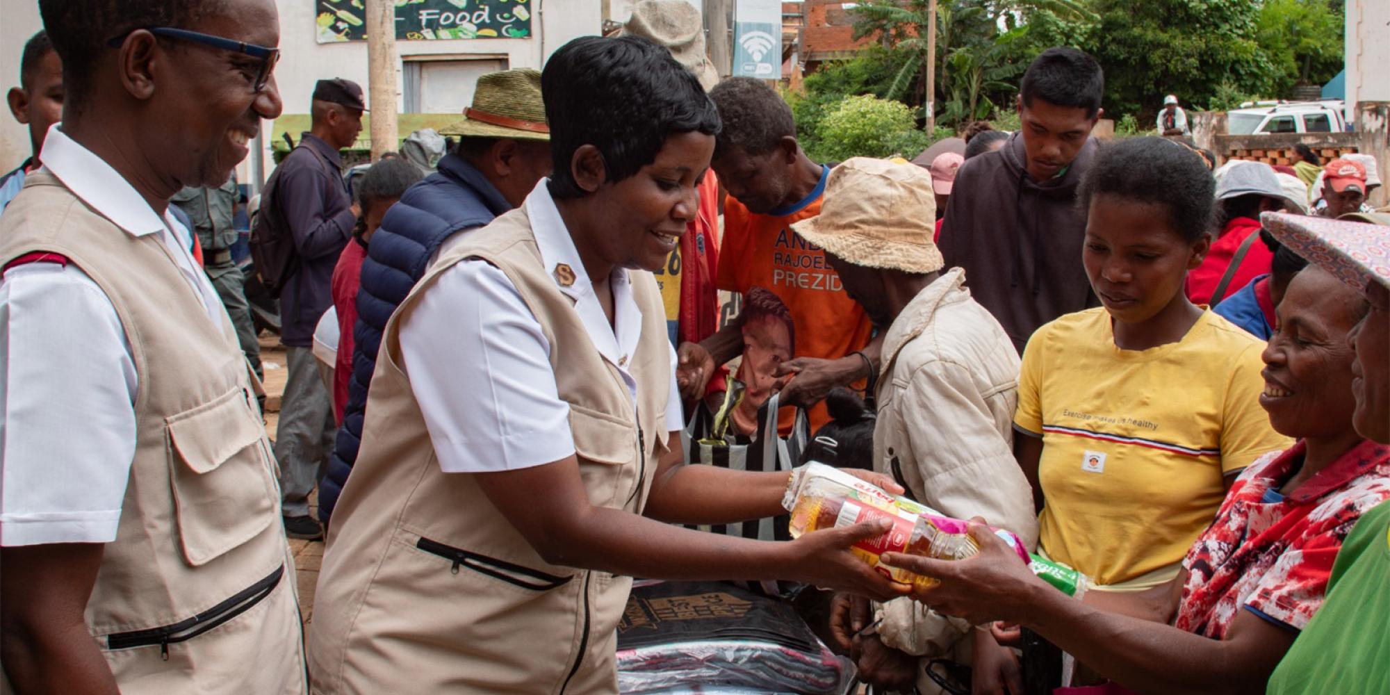 Salvation Army workers distribute food supplies