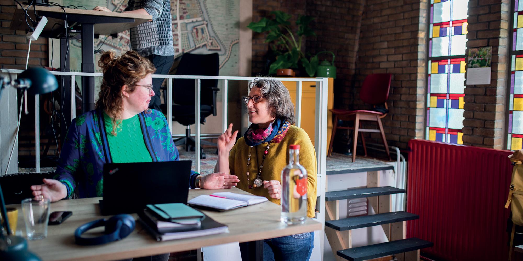Women have a conversation in the Flex Workspace