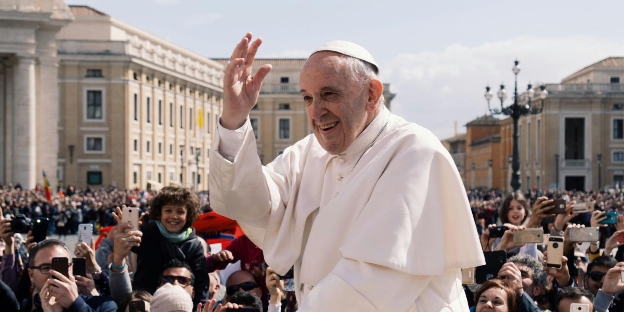 Pope Francis waves to the crowd in Vatican City