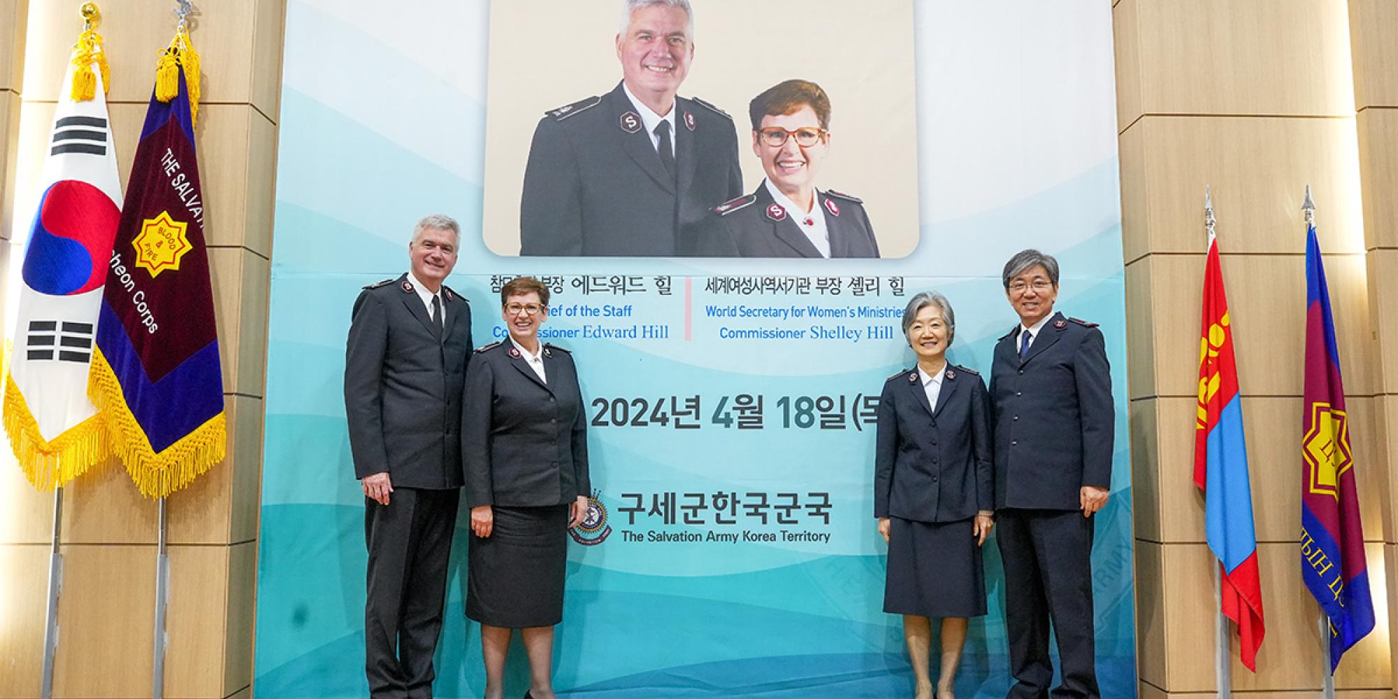 Commissioners Hill with leaders in Korea