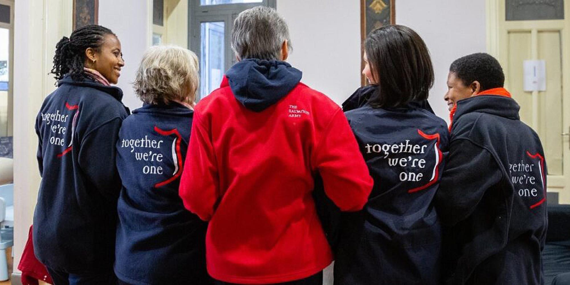 Green Light Project team members wearing Salvation Army jackets