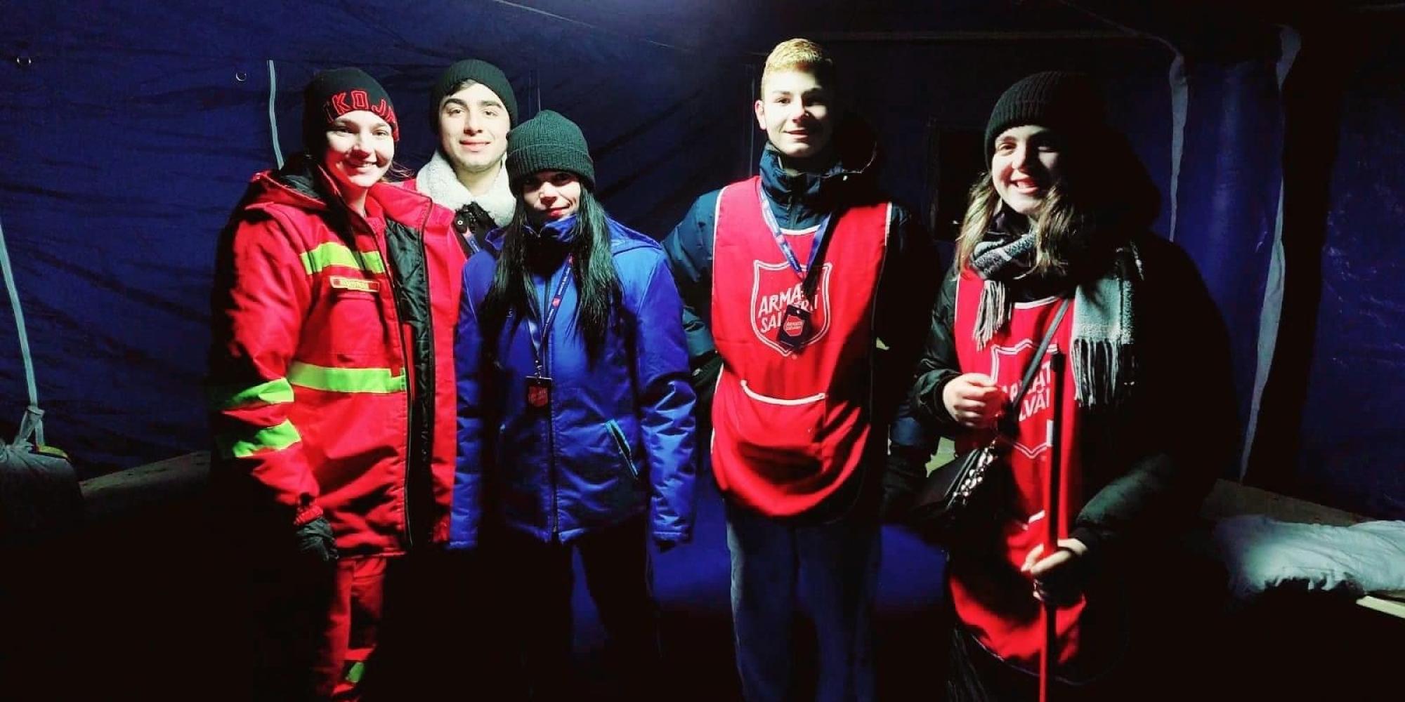 People wearing Salvation Army jackets in Romania