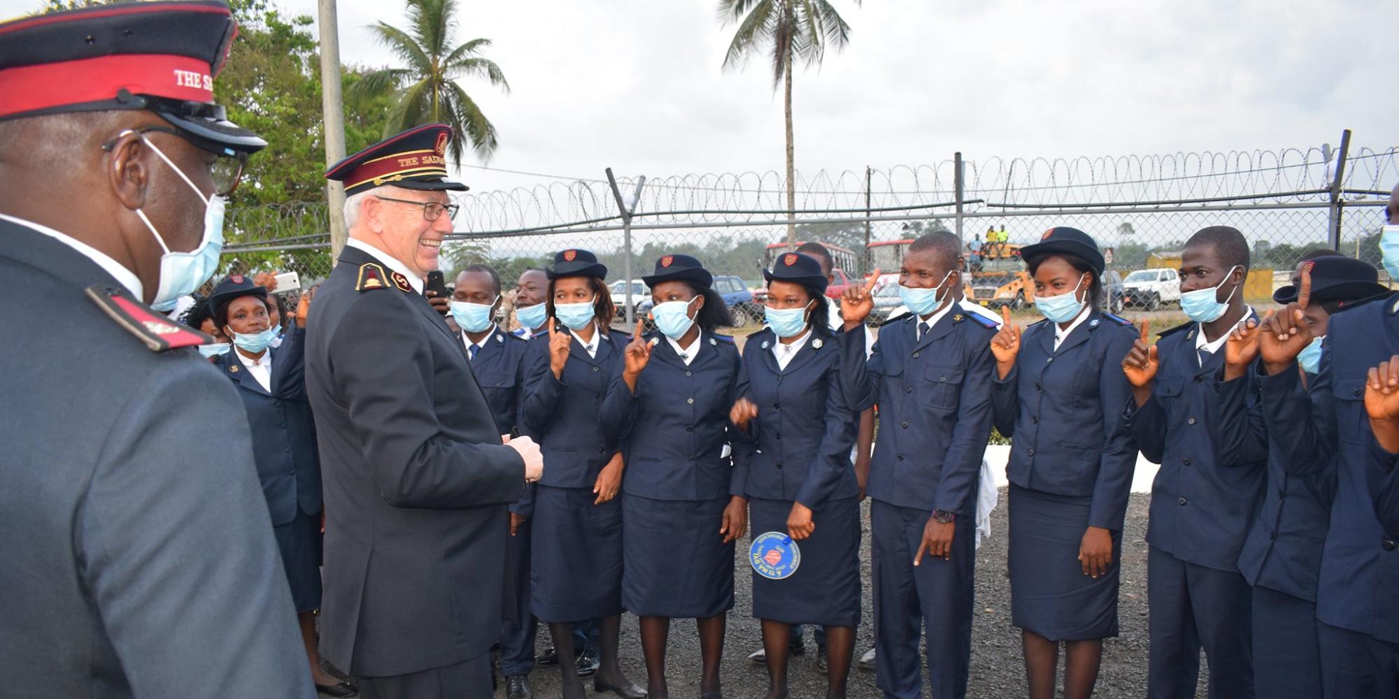 General Brian Peddle is greeted by Salvationists of the Liberia and Sierra Leone Command