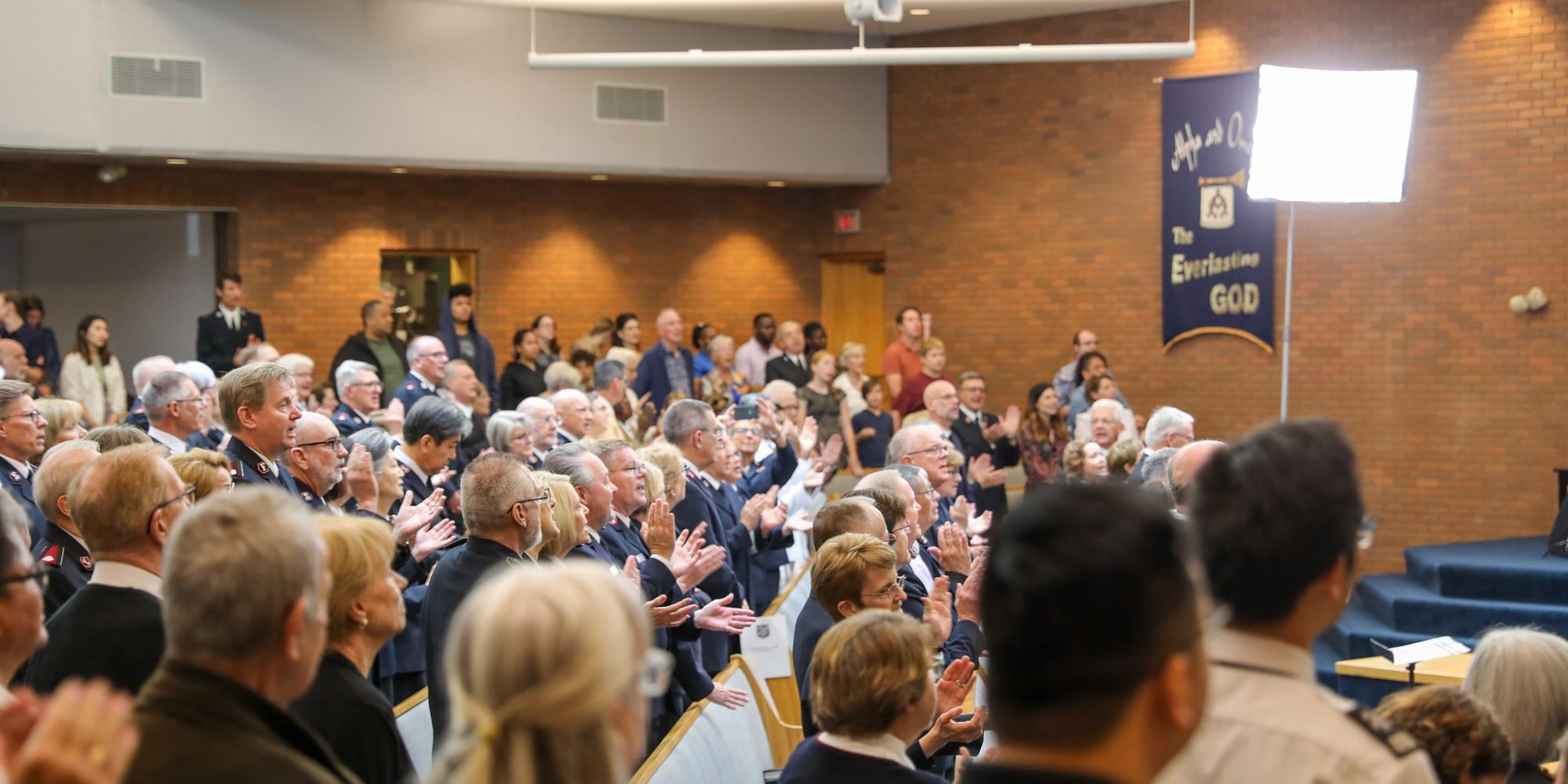 The congregation singing in worship