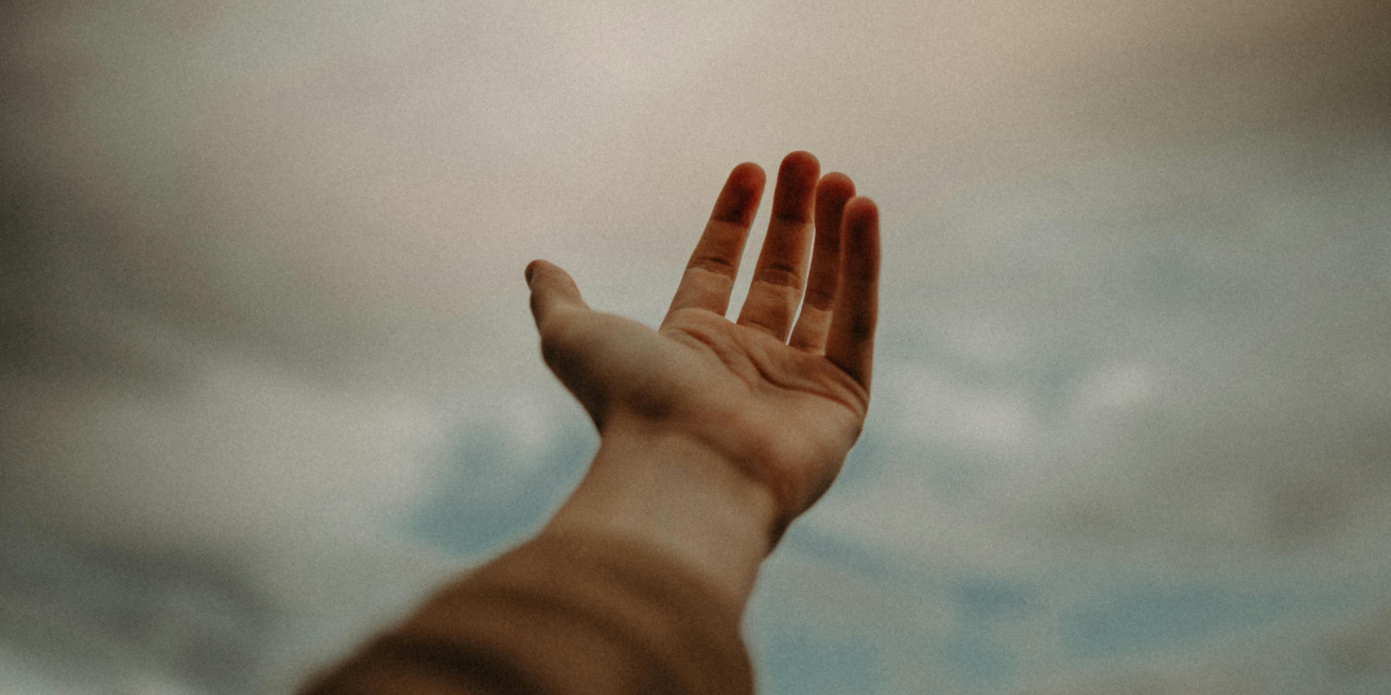 Image of a hand held out