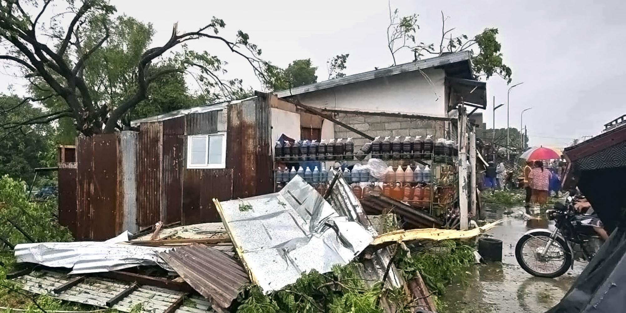 House with roof blown off