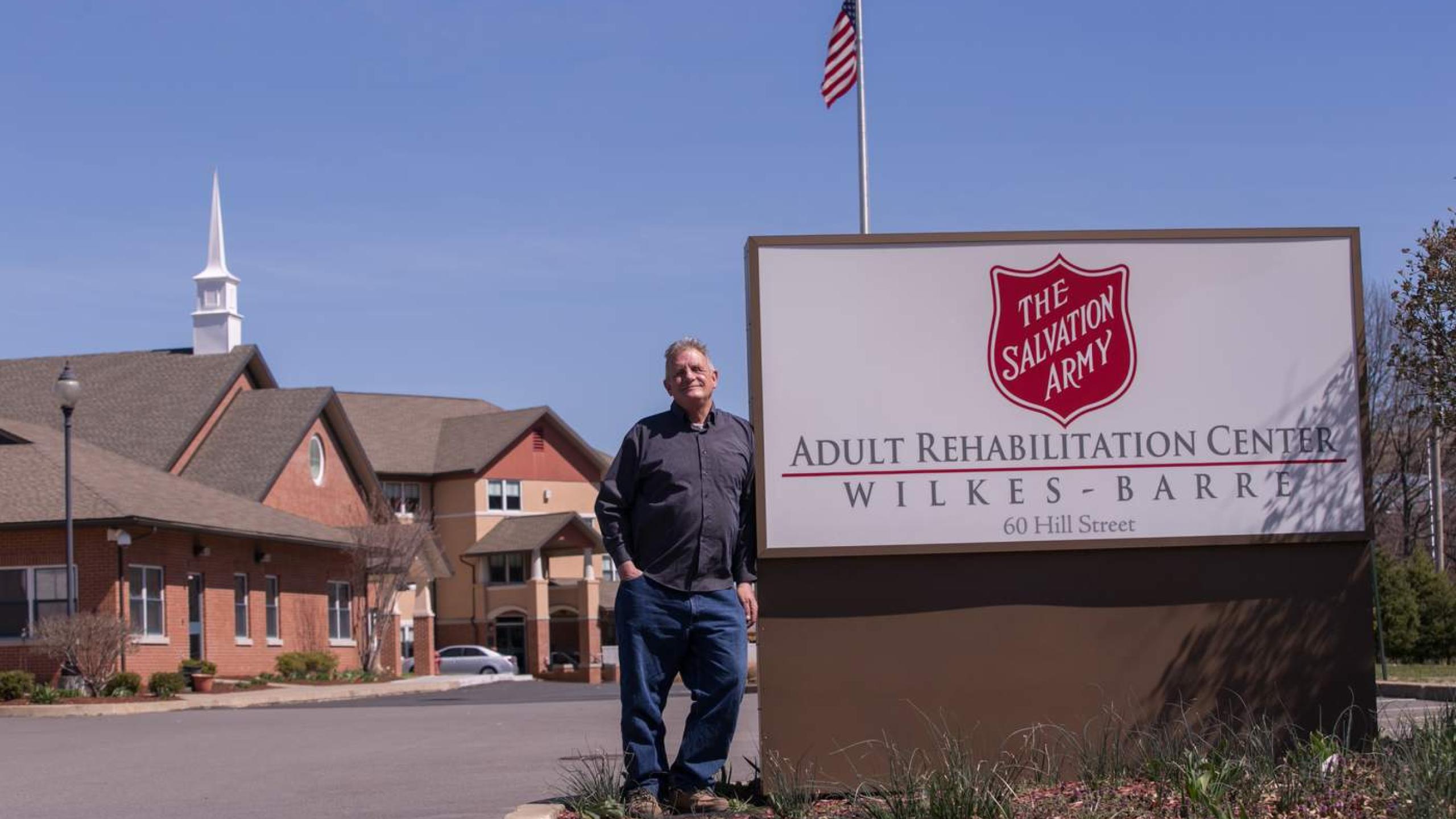 A man stands outside the Salvation Army adult rehabilitation centre