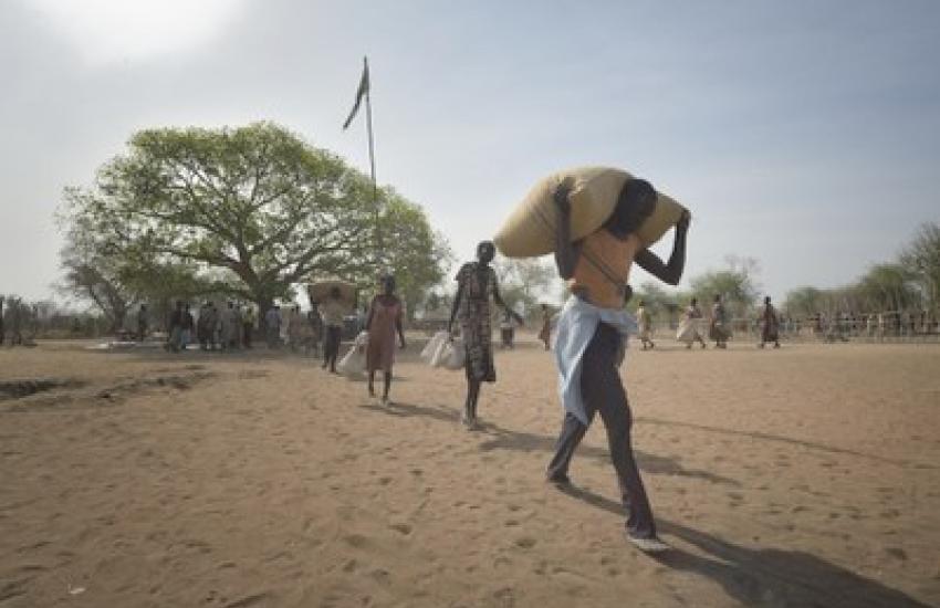 Photo: People receive food from the ACT Alliance in Rumading, South Sudan. © Paul Jeffrey/ACT Alliance, 2017