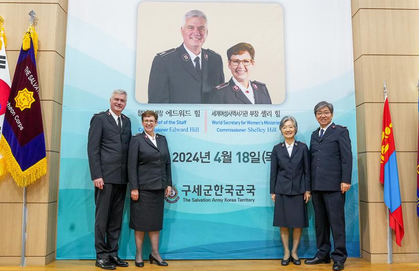 Commissioners Hill with leaders in Korea