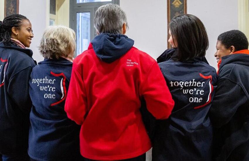 Green Light Project team members wearing Salvation Army jackets