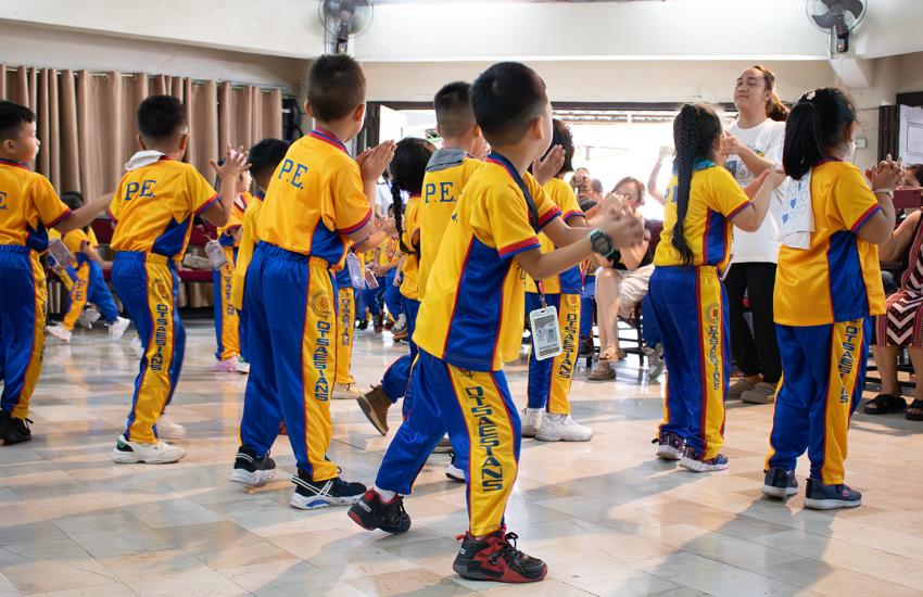 Young people take part in a dance routine