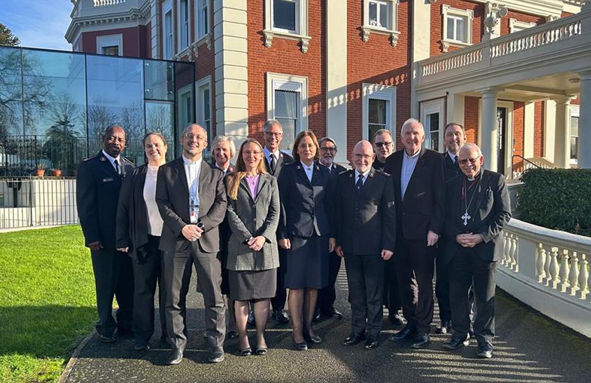 Salvationists and guests stand in front of Sunbury Court