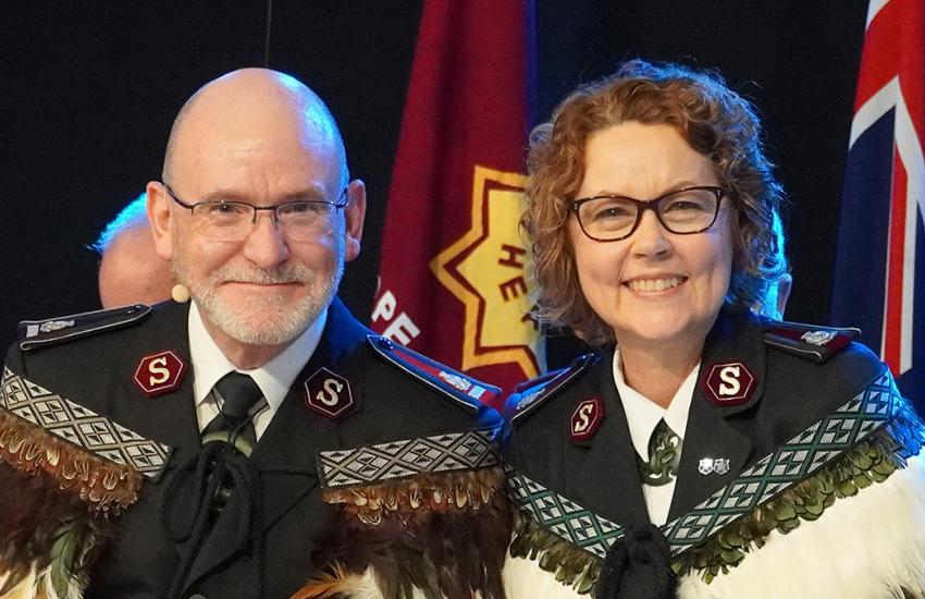 General Lyndon Buckingham and Commissioner Bronwyn Buckingham in full Salvation Army uniform and feathered Korowai (Māori cloak)