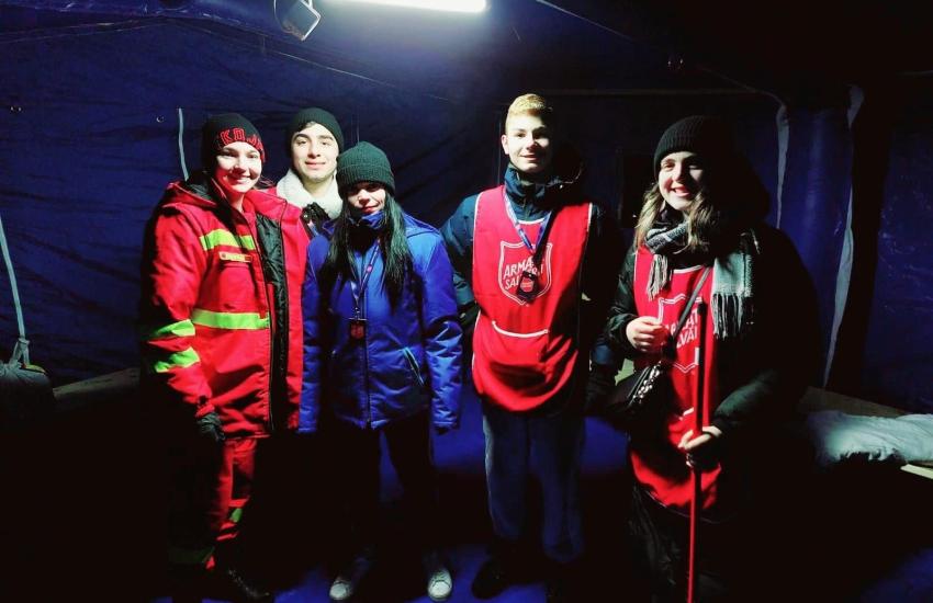 People wearing Salvation Army jackets in Romania