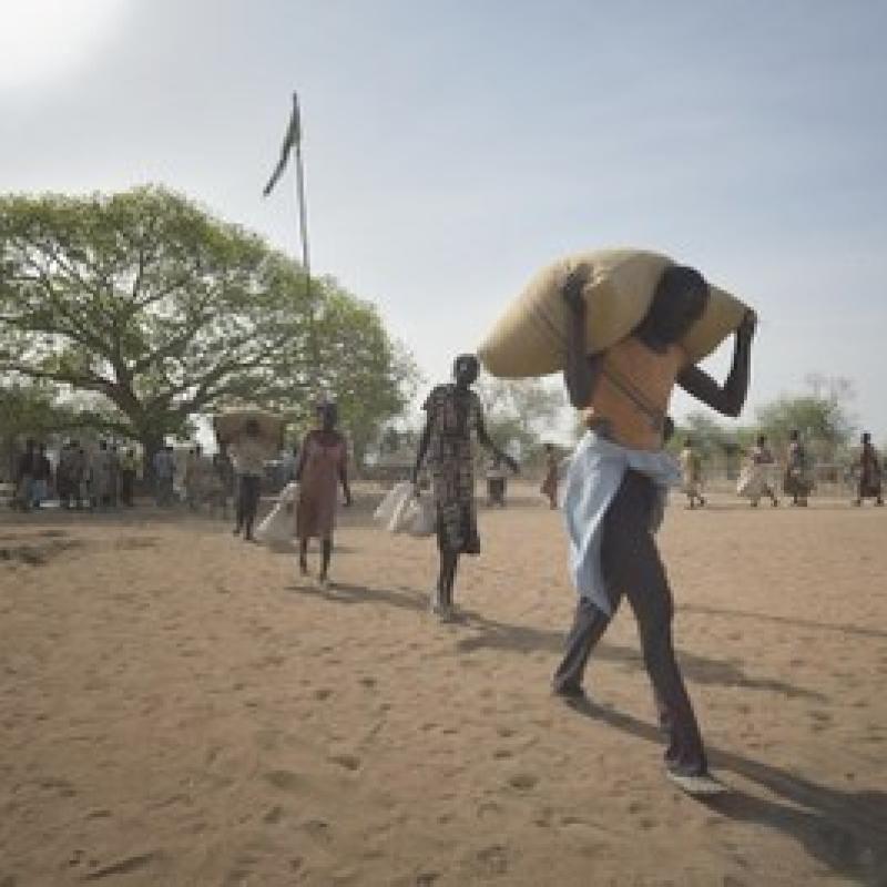  Photo: People receive food from the ACT Alliance in Rumading, South Sudan. © Paul Jeffrey/ACT Alliance, 2017