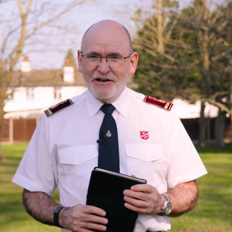 General Lyndon Buckingham holds a Bible