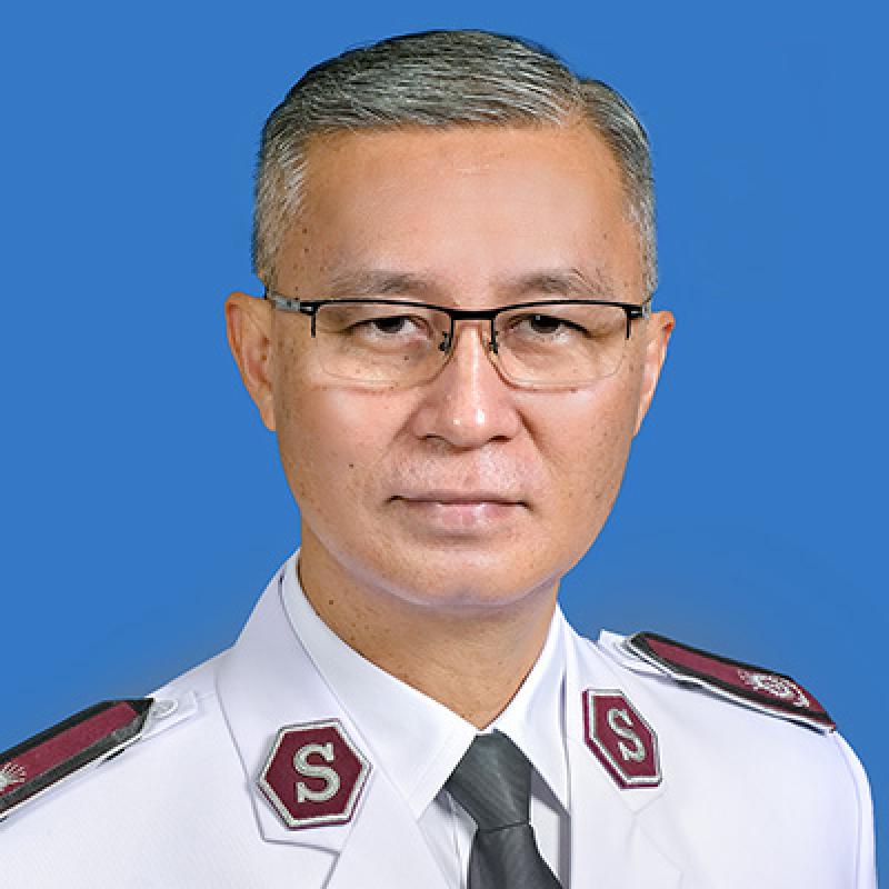 Headshot of Commissioner Yusak Tampai