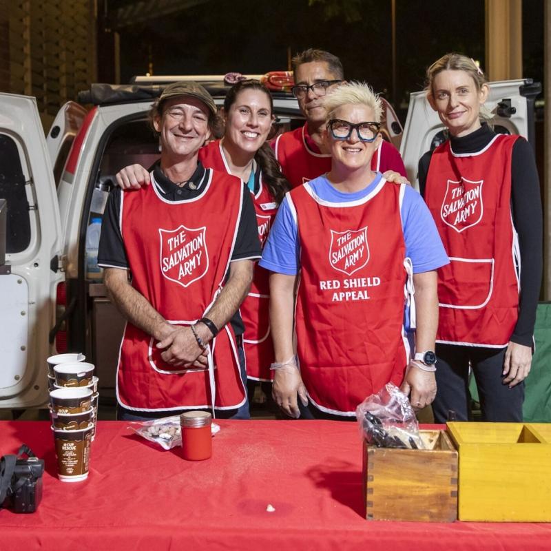 Salvation Army volunteers wearing red Army tabards
