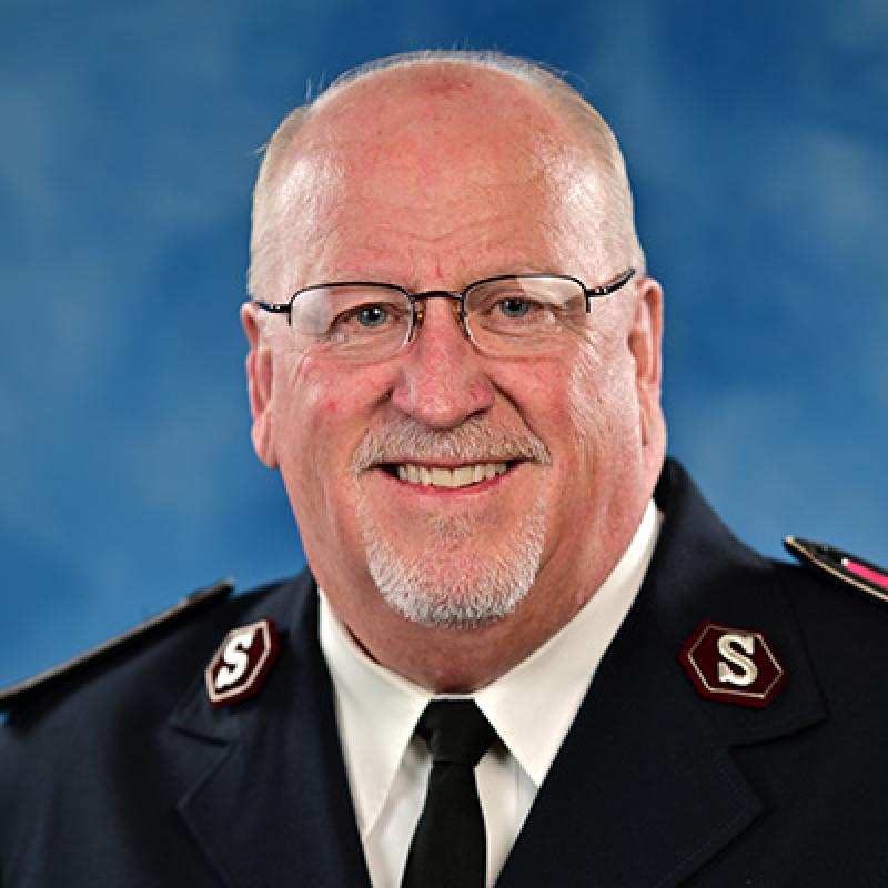 Headshot of Commissioner Douglas Riley