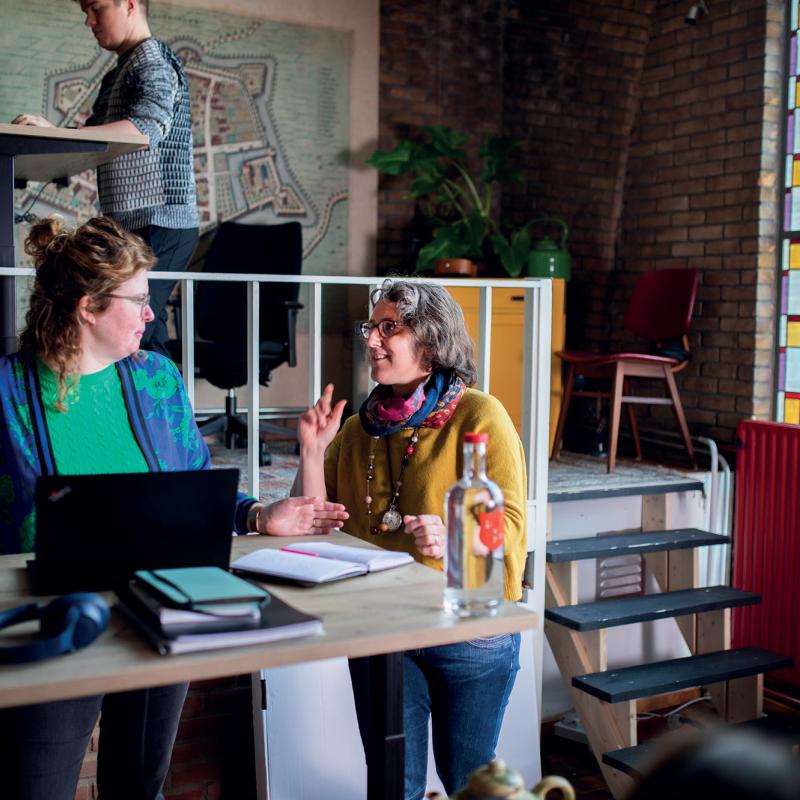 Women have a conversation in the Flex Workspace
