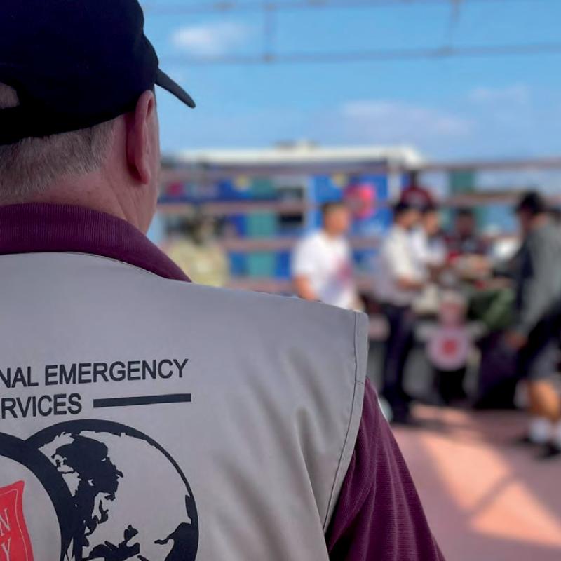 A man wearing an International Emergency Services jacket