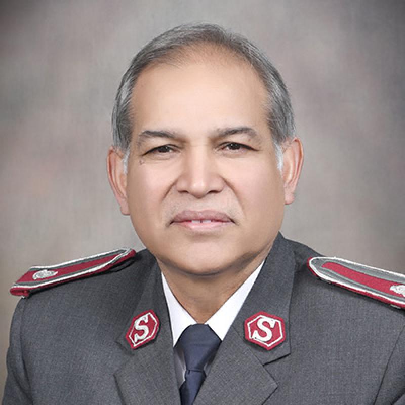 Headshot of Colonel MacDonald Chandi