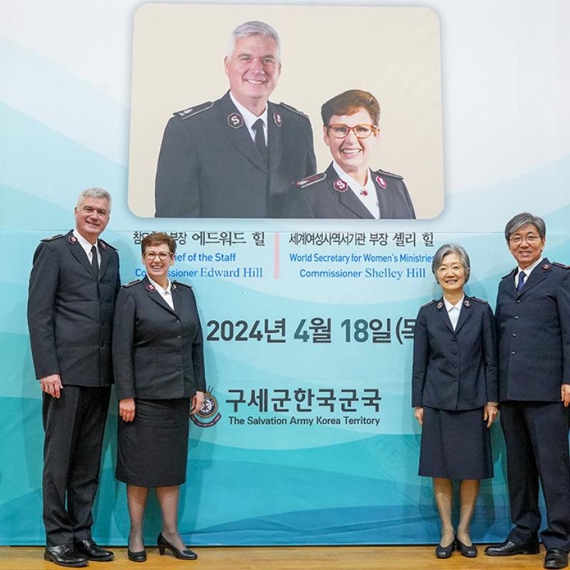 Commissioners Hill with leaders in Korea