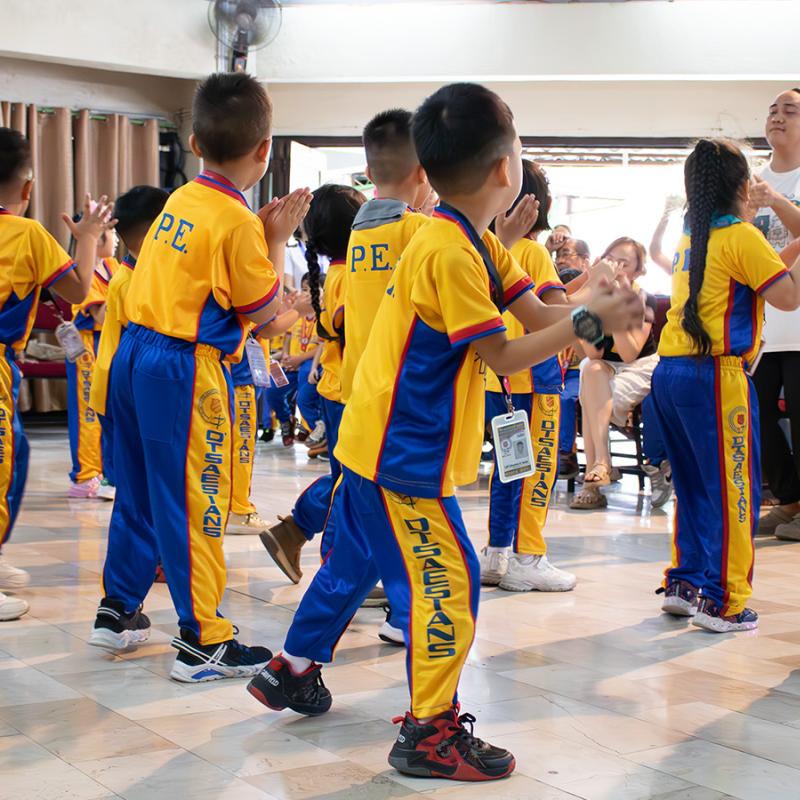 Young people take part in a dance routine