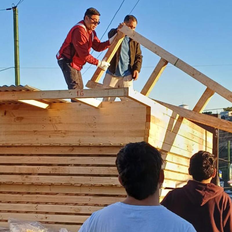 Salvation Army team members unload building materials